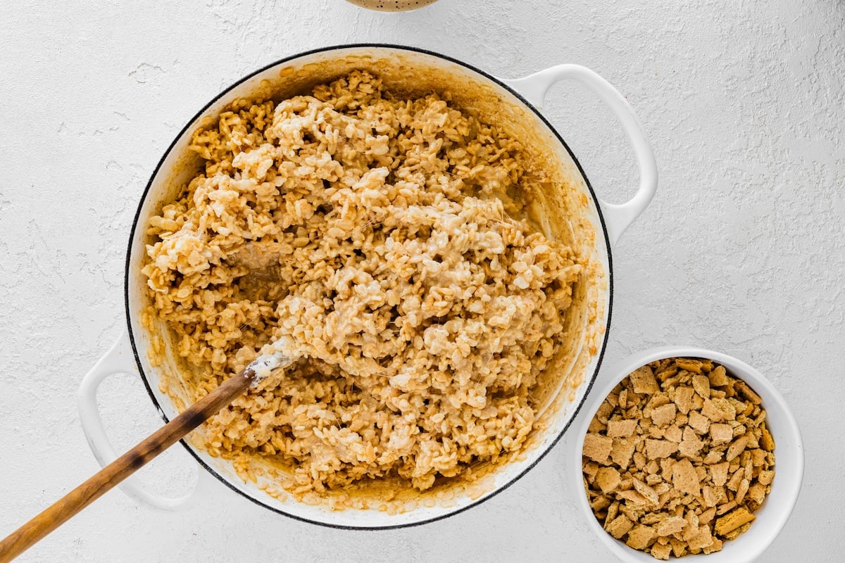 s'mores rice krispie treats in pot with wooden spoon. 