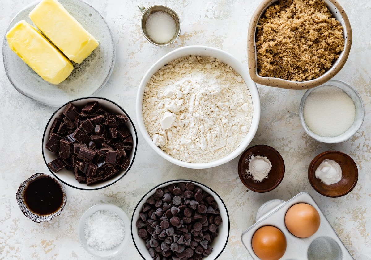 ingredients in bowls to make brown butter chocolate chip cookie bars. 