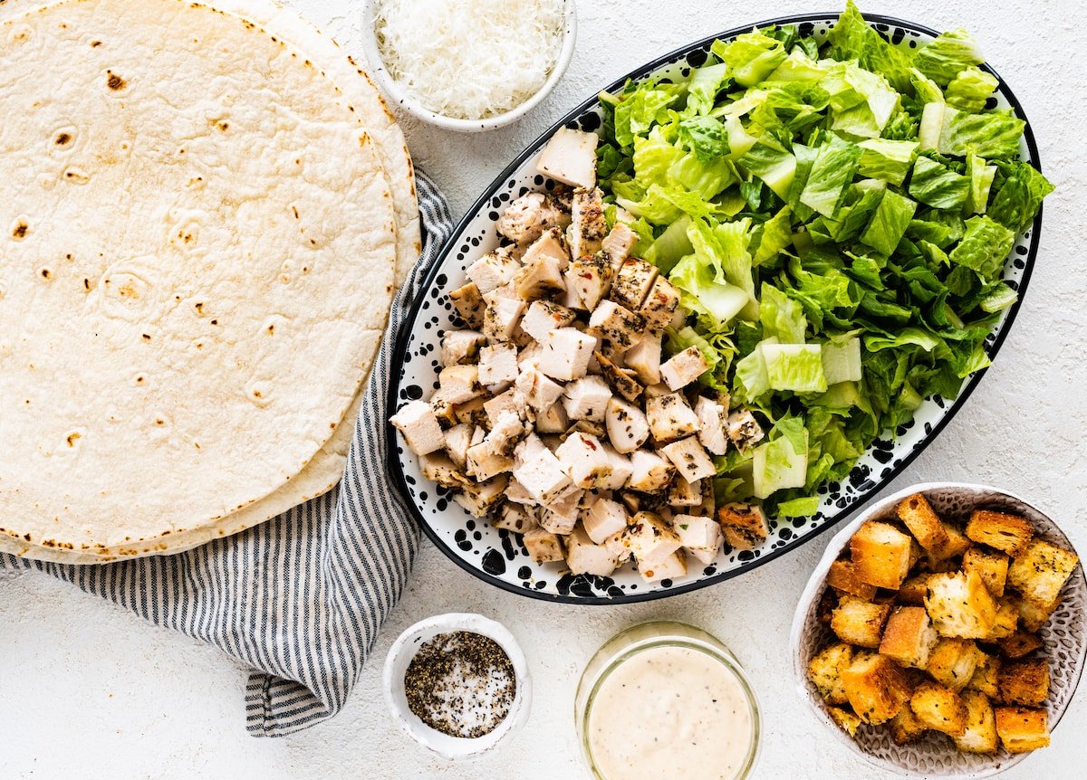 ingredients to make chicken caesar wraps. 