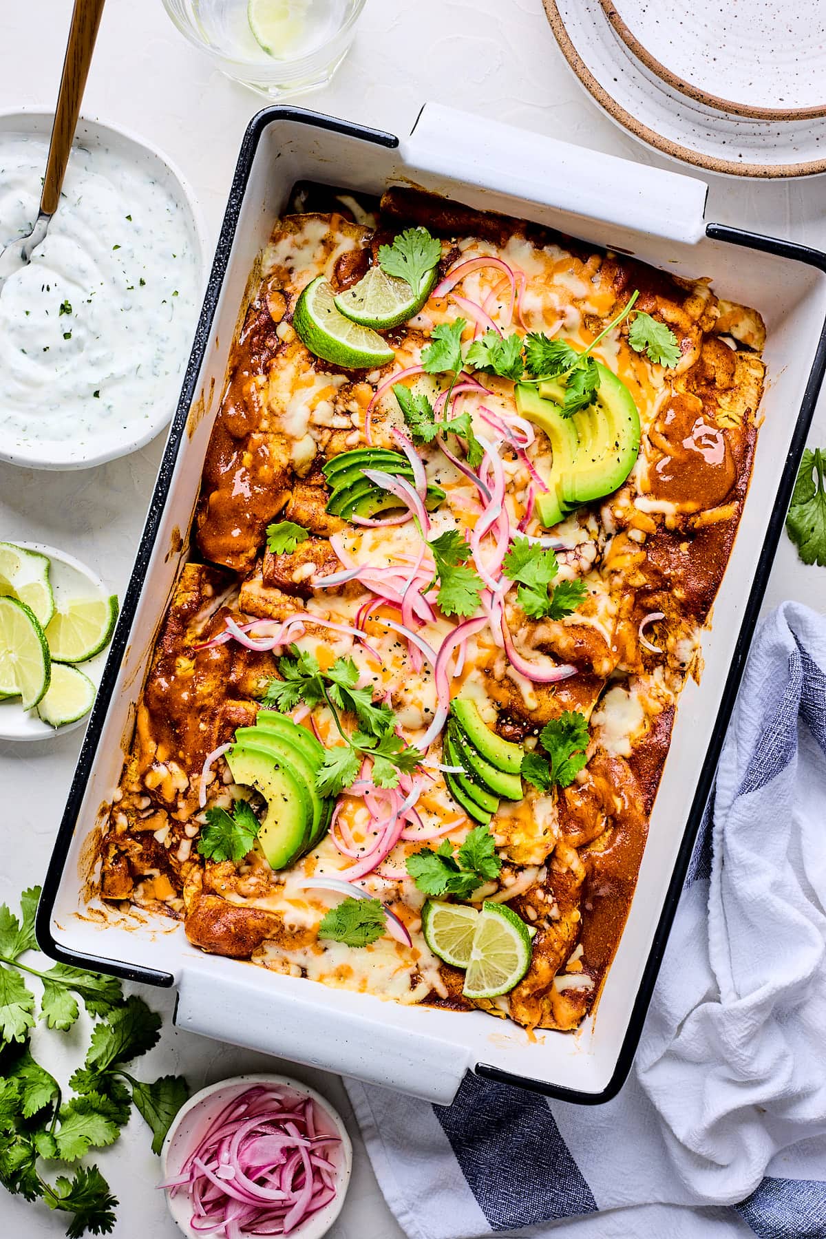 cauliflower enchiladas in pan. 