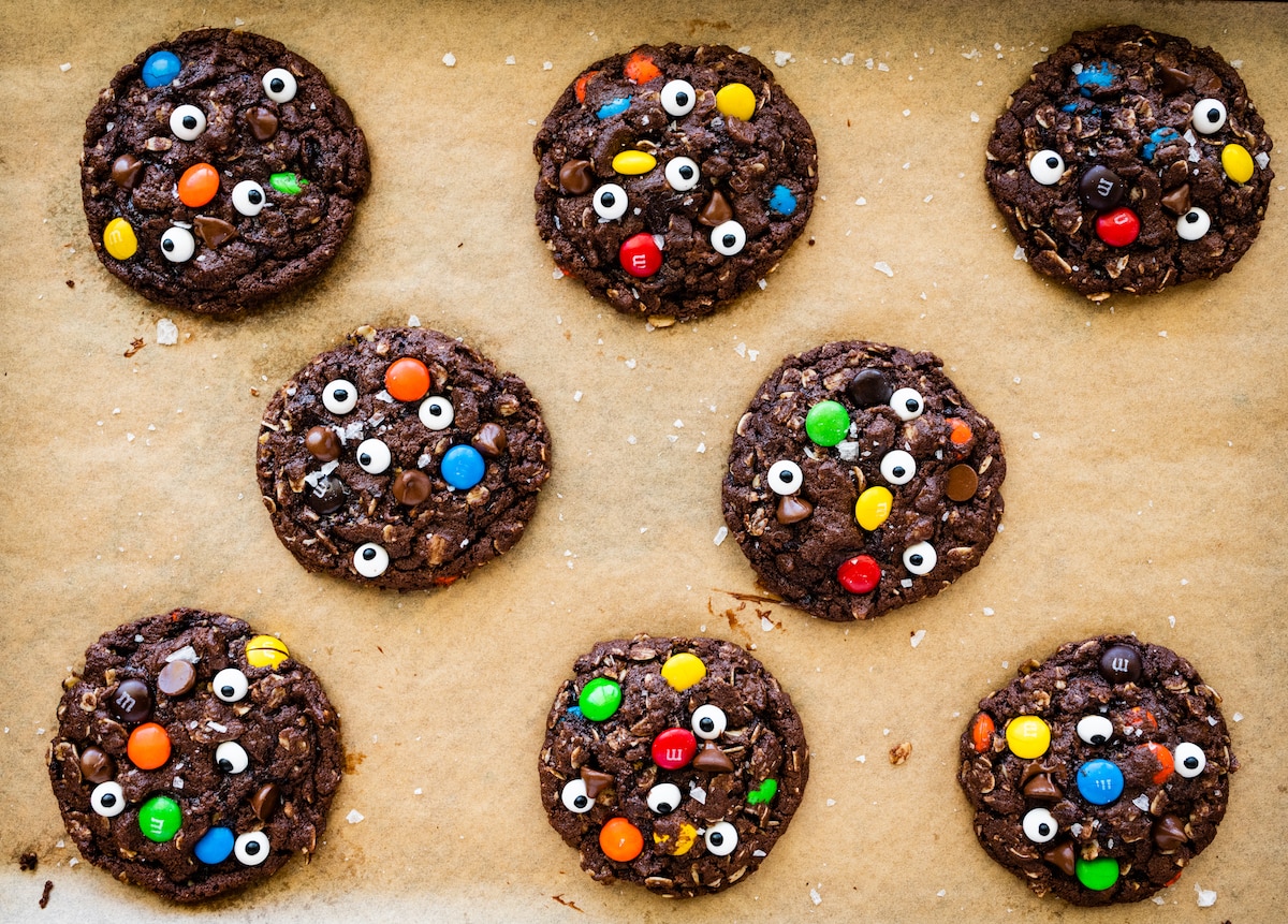 chocolate monster cookies on baking sheet. 