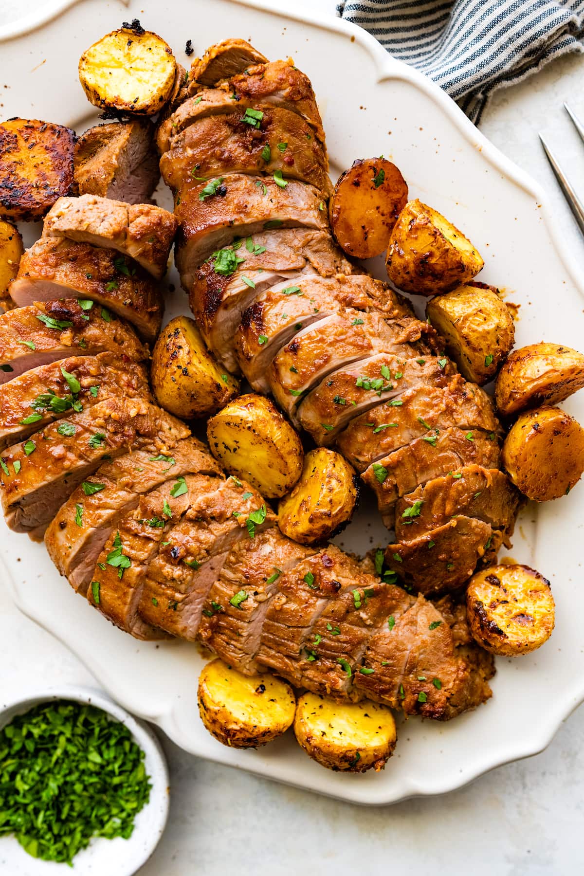 https://www.twopeasandtheirpod.com/wp-content/uploads/2023/10/Sheet-Pan-Pork-Tenderloin-17.jpg