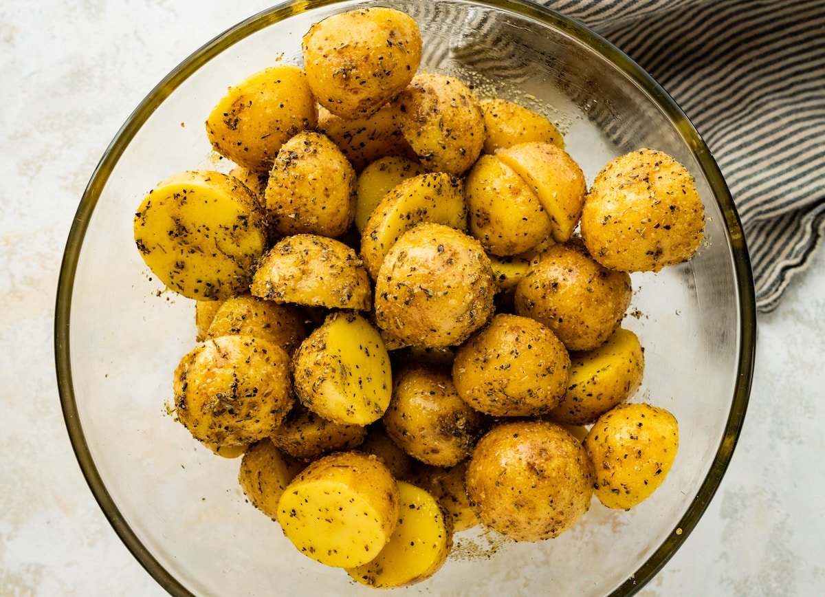 seasoned potatoes in mixing bowl. 