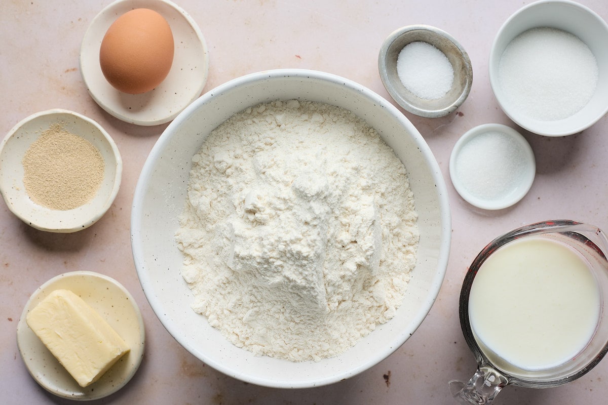 ingredients in bowls to make dinner rolls. 