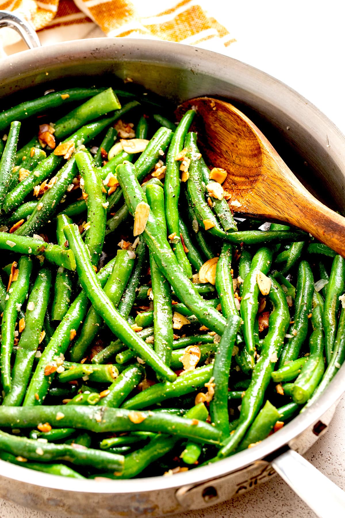 close up of green beans almondine in skillet. 