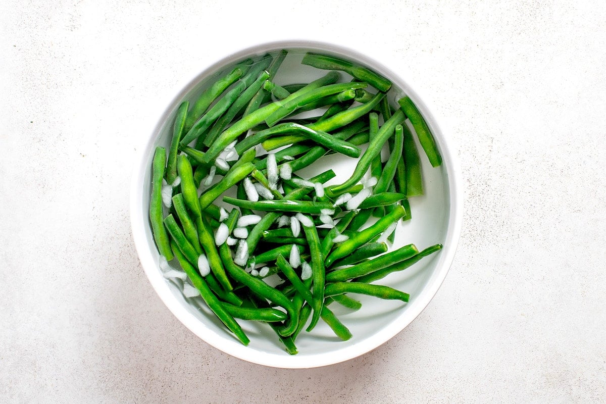 green beans in an ice bath. 