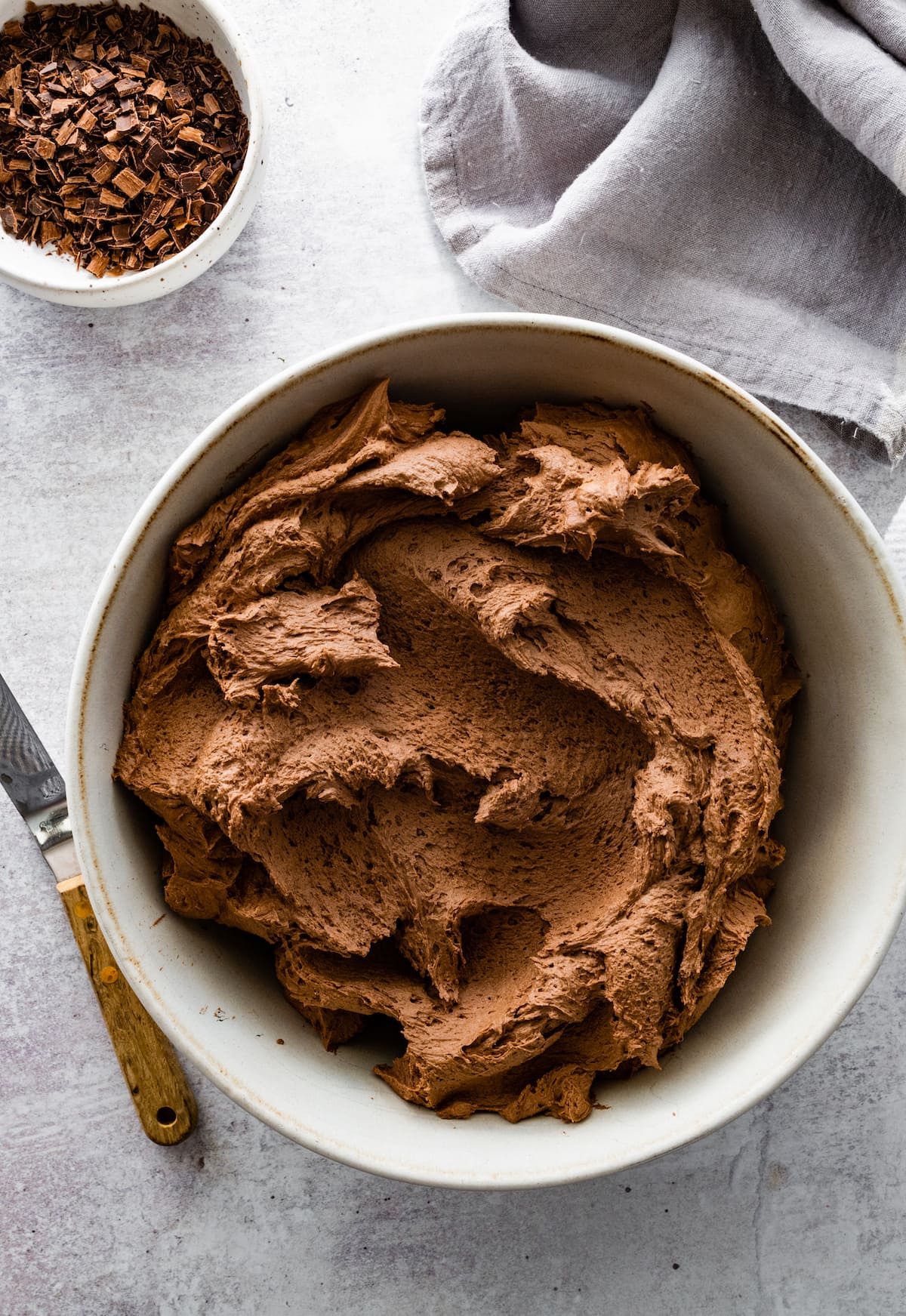chocolate buttercream frosting in bowl. 
