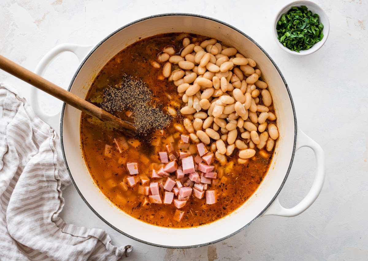 ham and white bean soup in pot. 