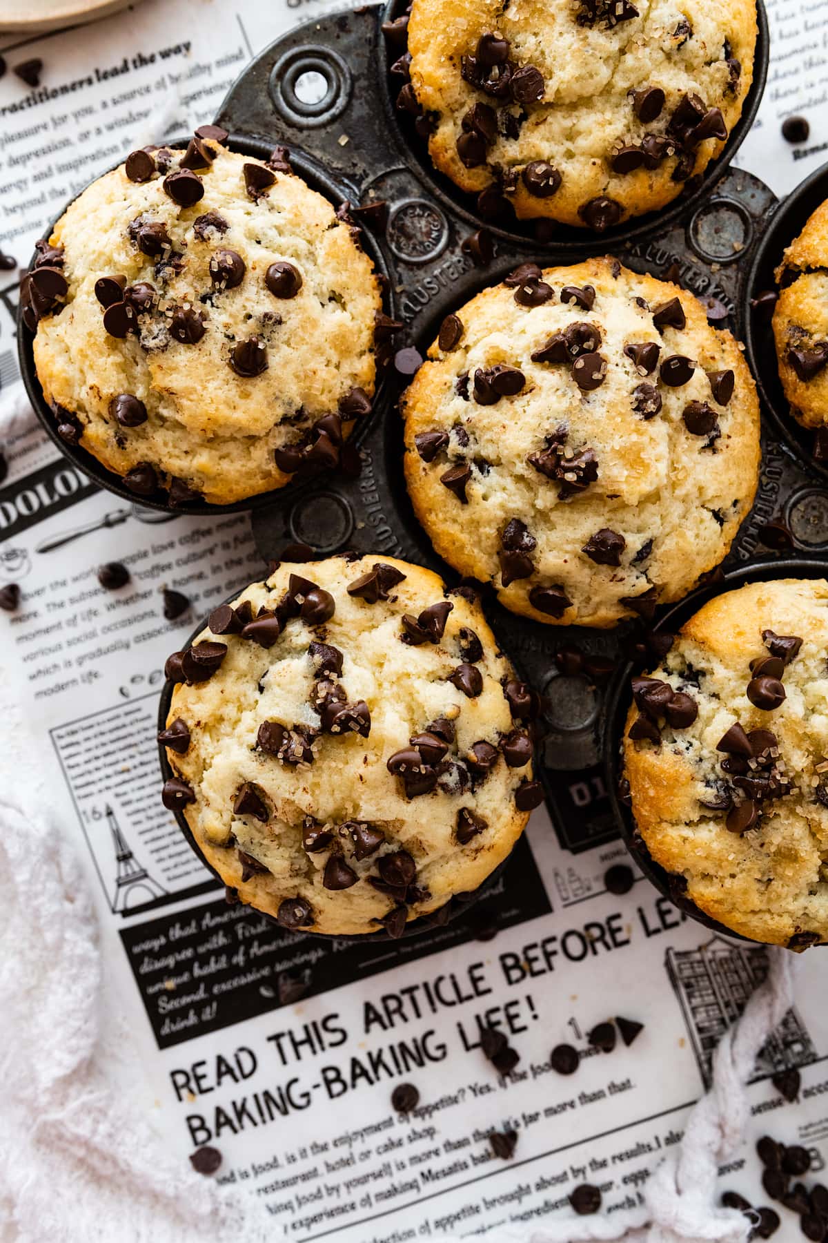 chocolate chip muffins in muffin tin. 