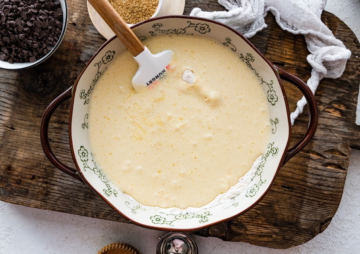 muffin batter in bowl with spatula. 