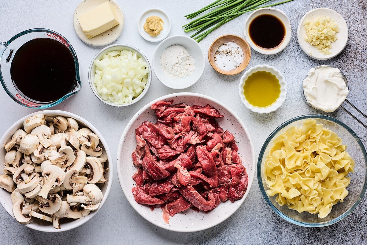ingredients in bowls to make beef stroganoff. 