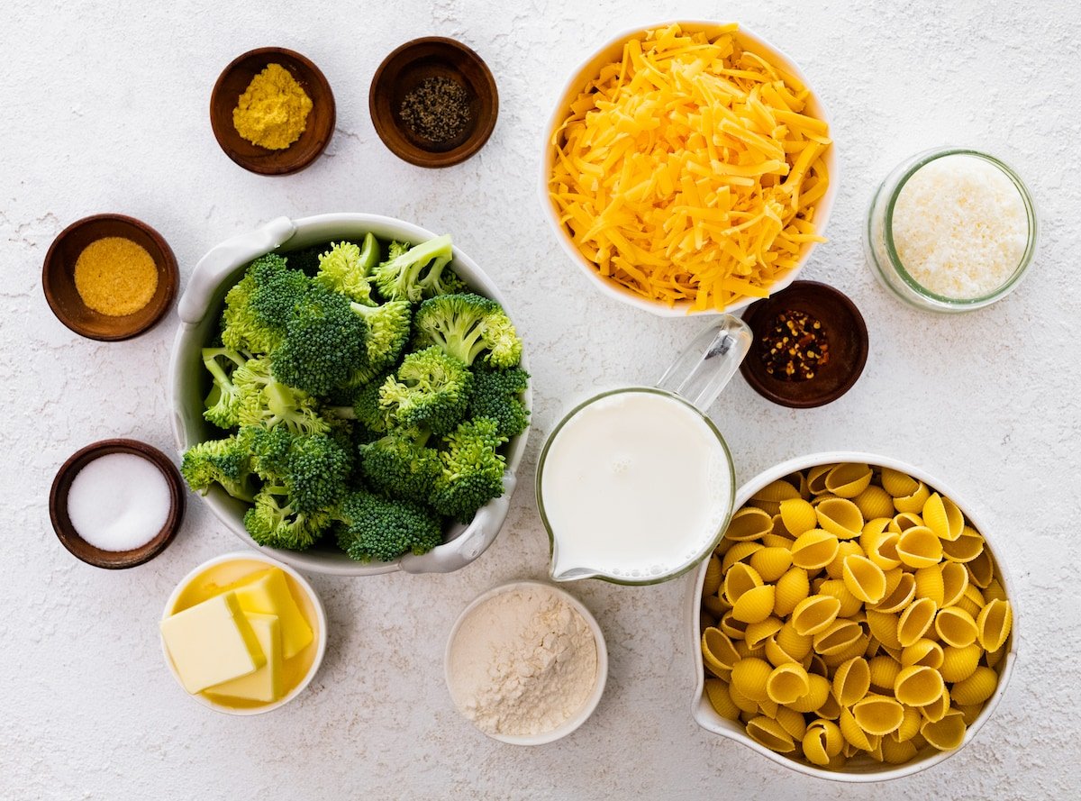ingredients in bowls to make broccoli mac and cheese. 