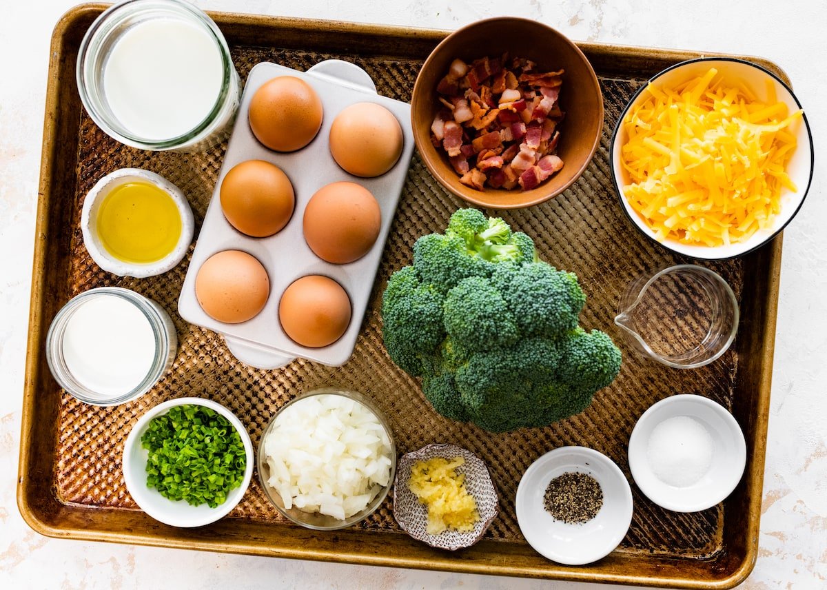 ingredients to make crustless quiche on baking sheet. 