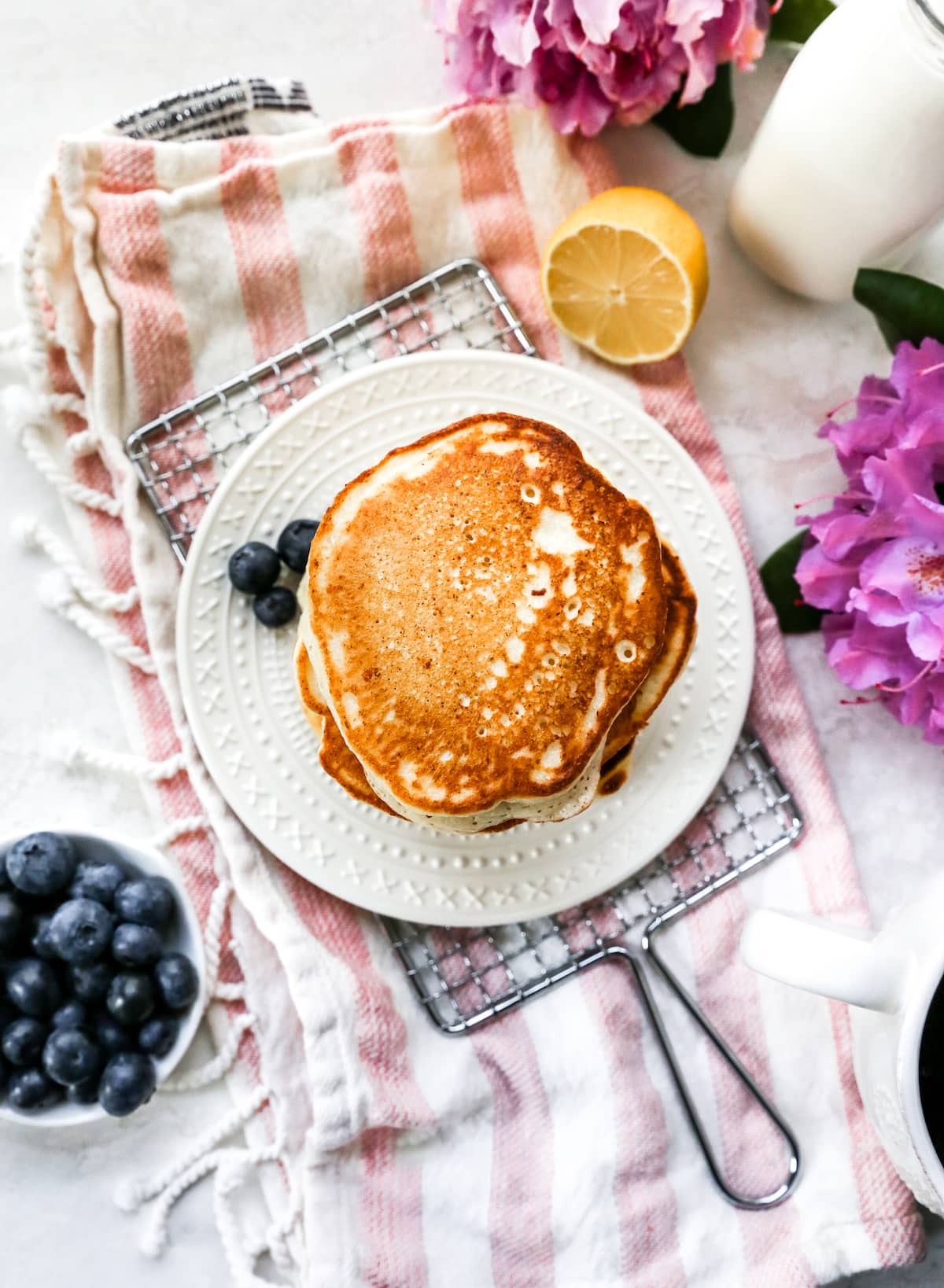 lemon ricotta pancakes on plate. 