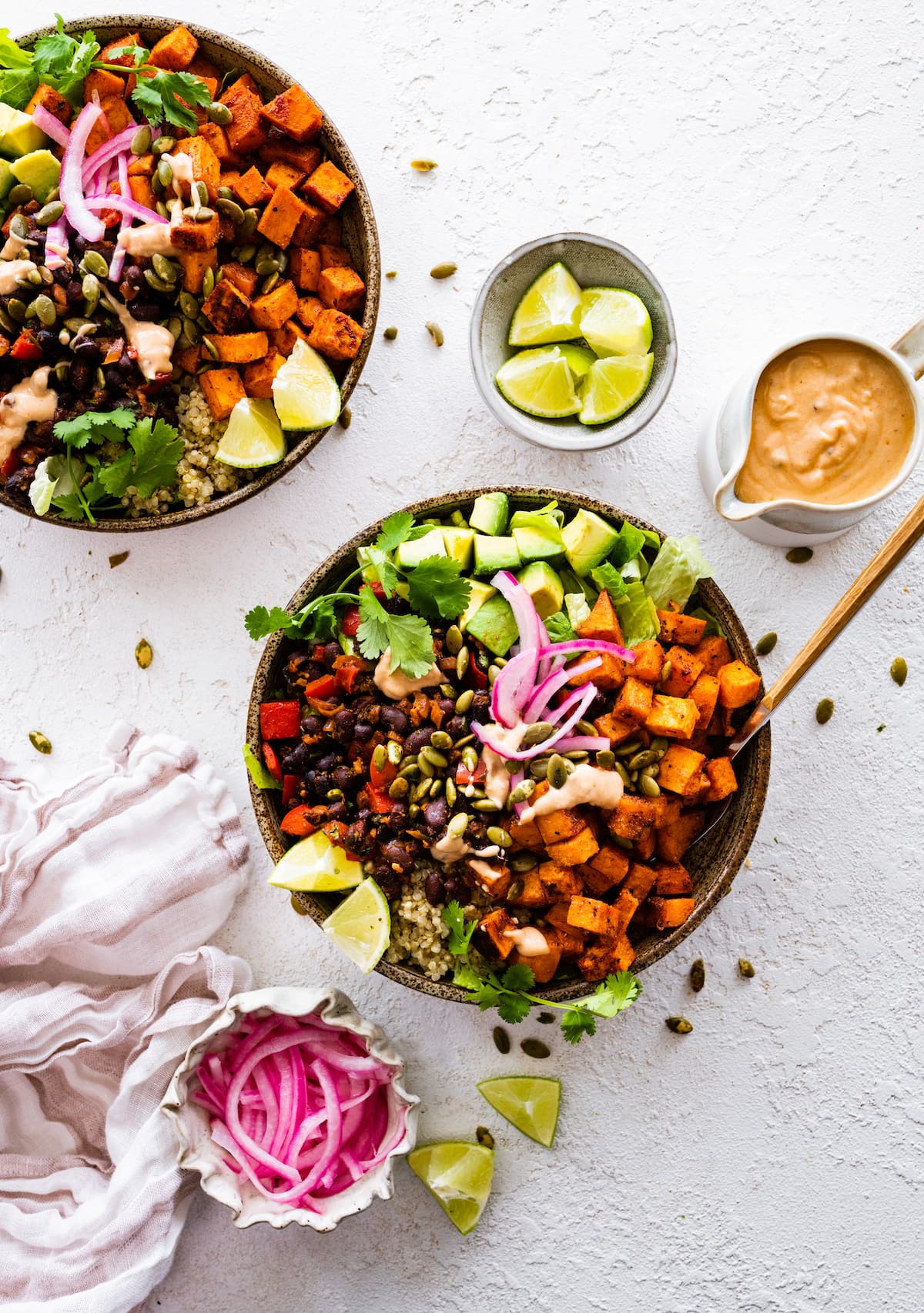 roasted sweet potato black bean bowls with chipotle dressing. 