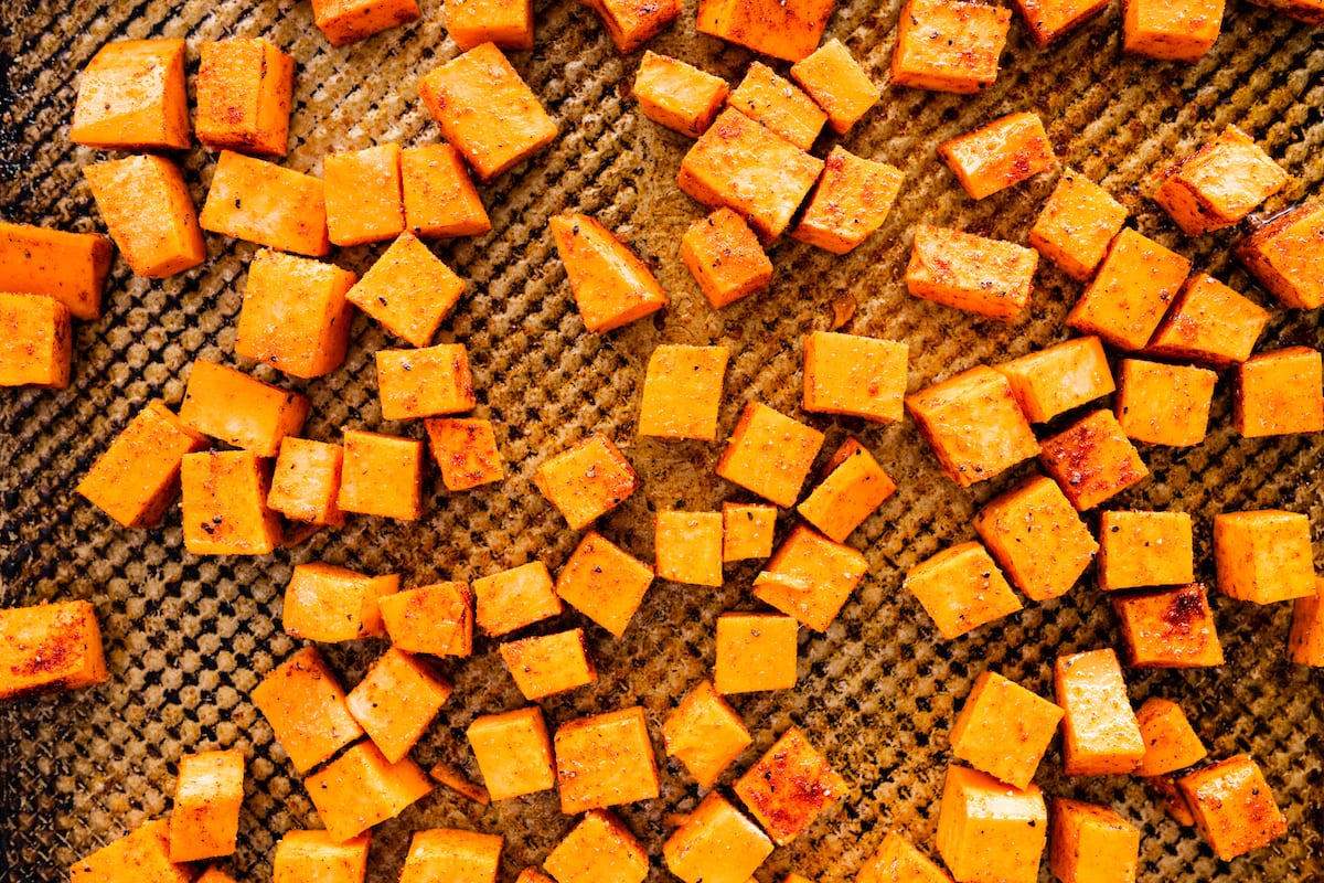 roasted sweet potatoes on baking sheet. 