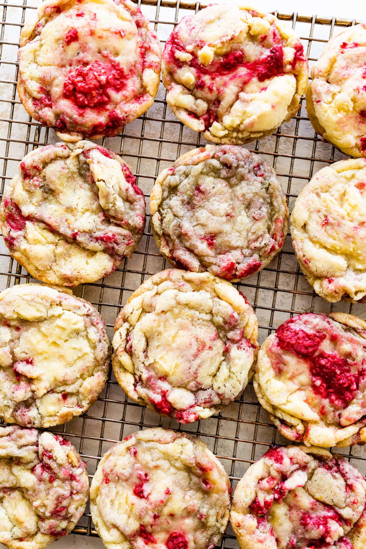 lemon raspberry cookies on cooling rack. 
