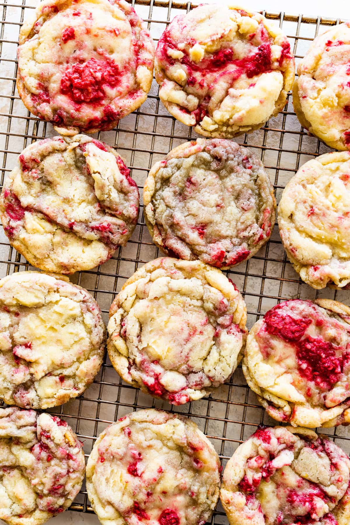 lemon raspberry cookies on cooling rack. 