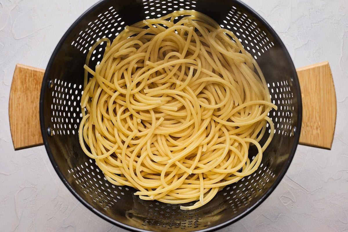 spaghetti in colander. 