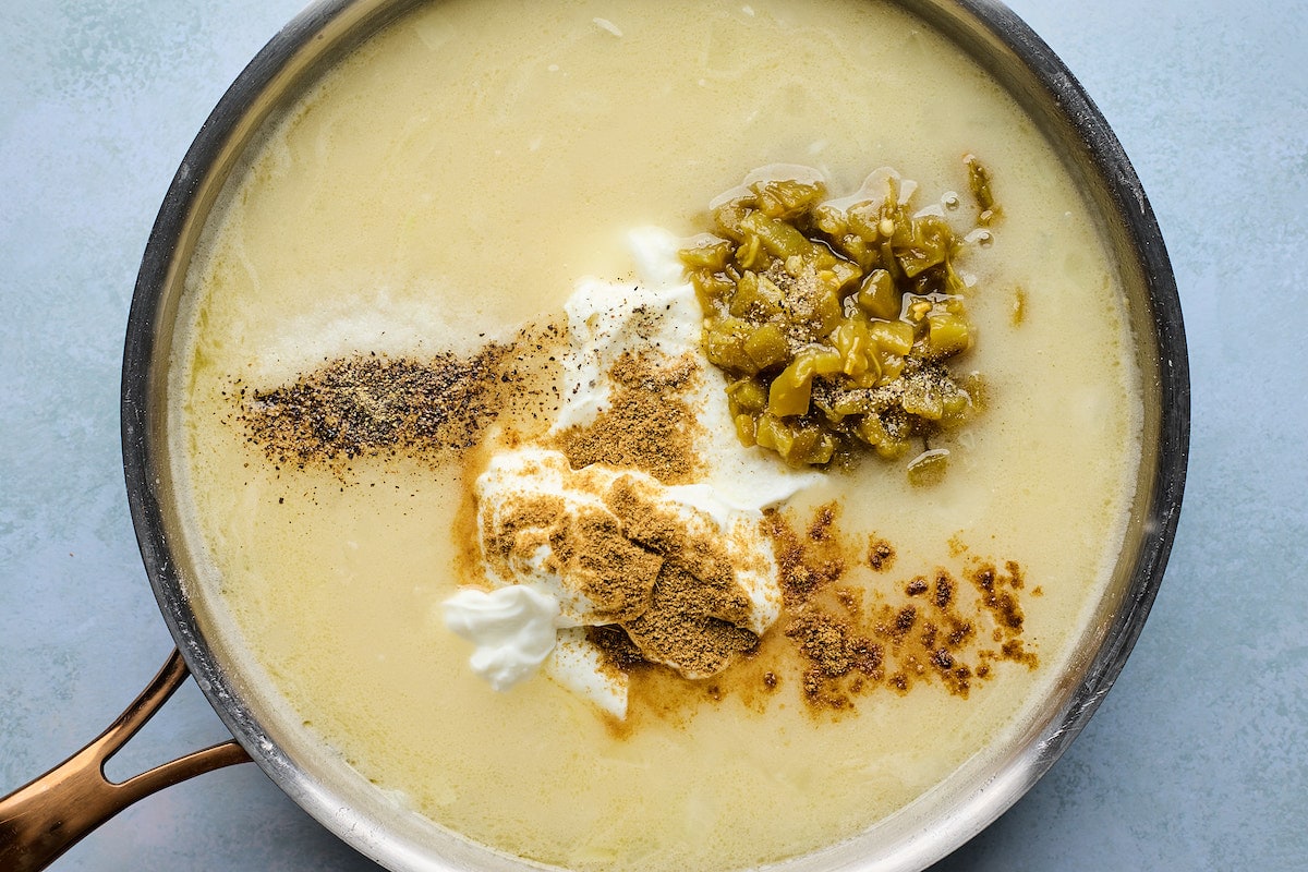 white chicken enchilada sauce in large skillet. 