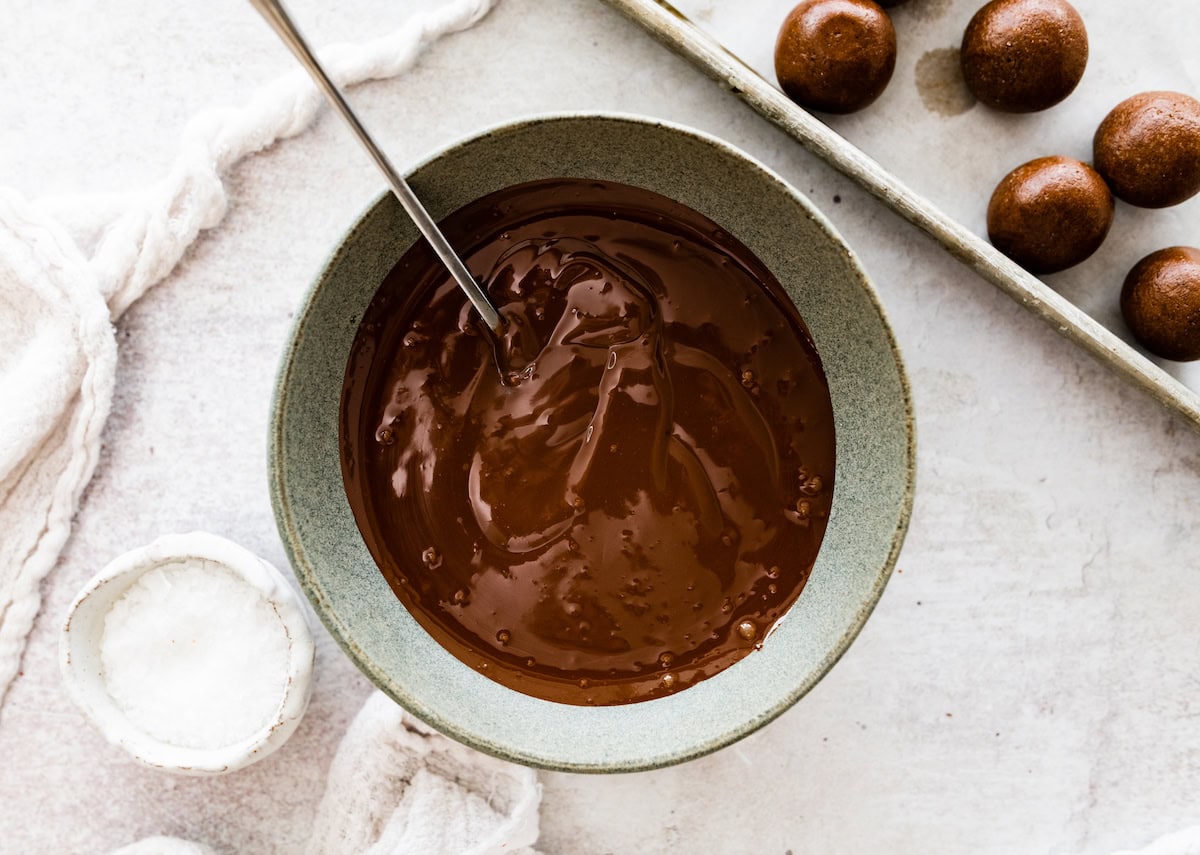 melted chocolate in bowl with spoon. 