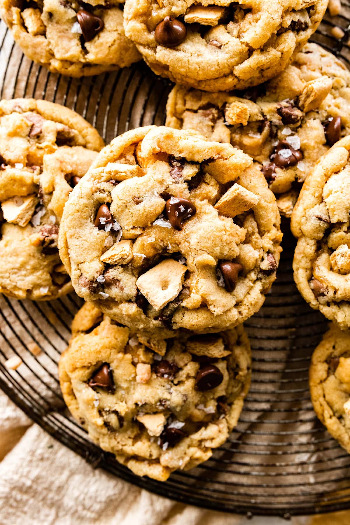 close up of graham cracker toffee chocolate chip cookies on cooling rack. 