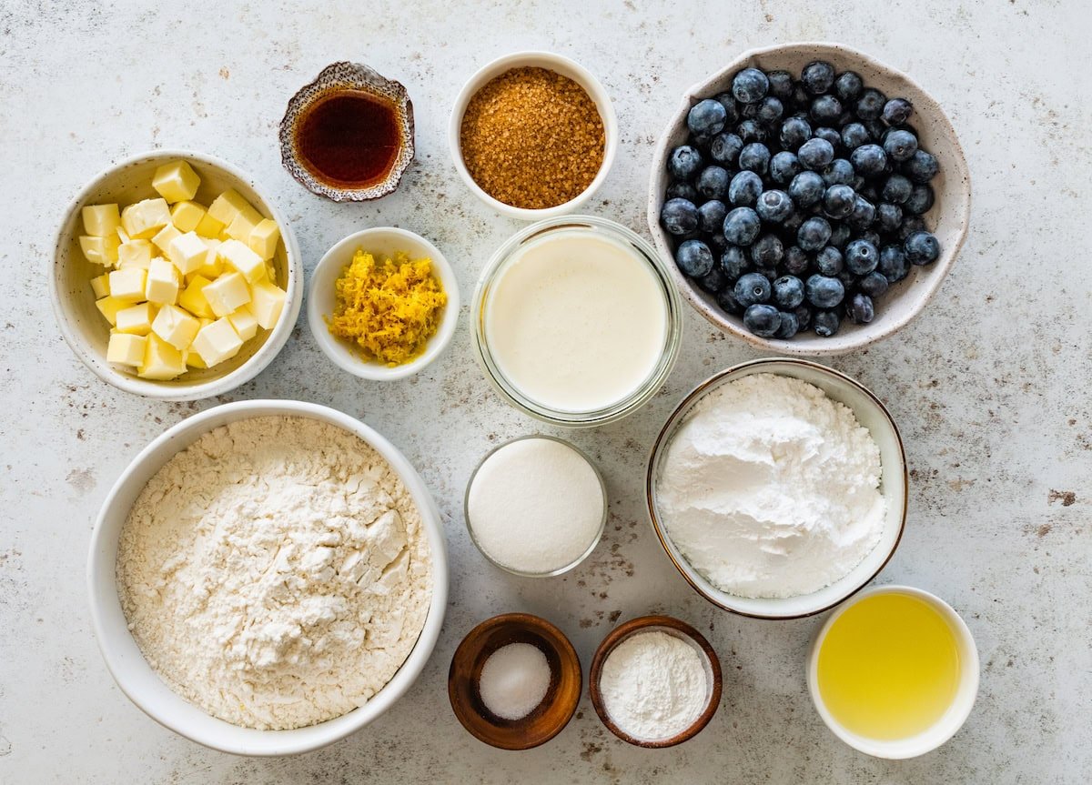 ingredients in bowls to make lemon blueberry scones. 