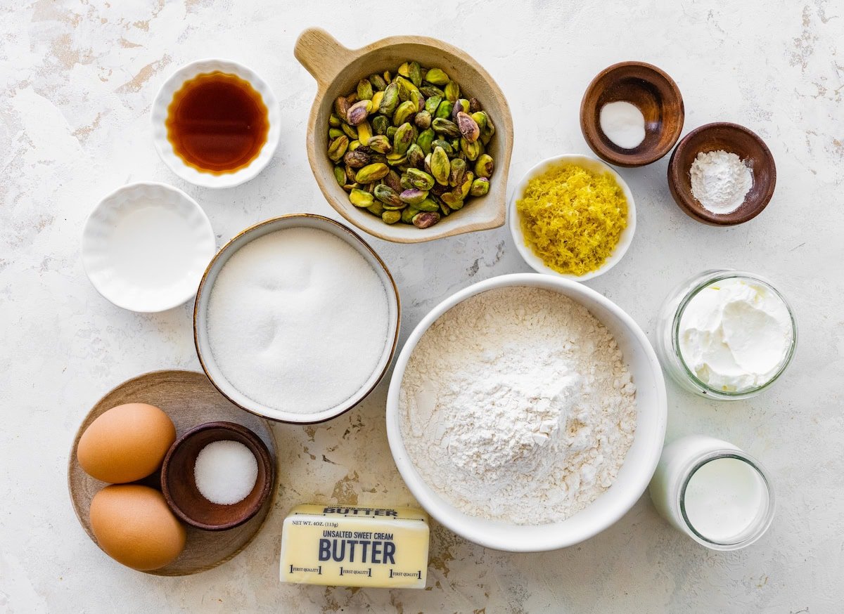 ingredients in bowls to make lemon pistachio cupcakes.