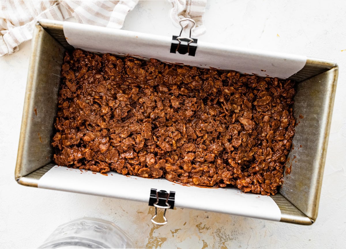 chocolate crunch bars pressed in loaf pan. 