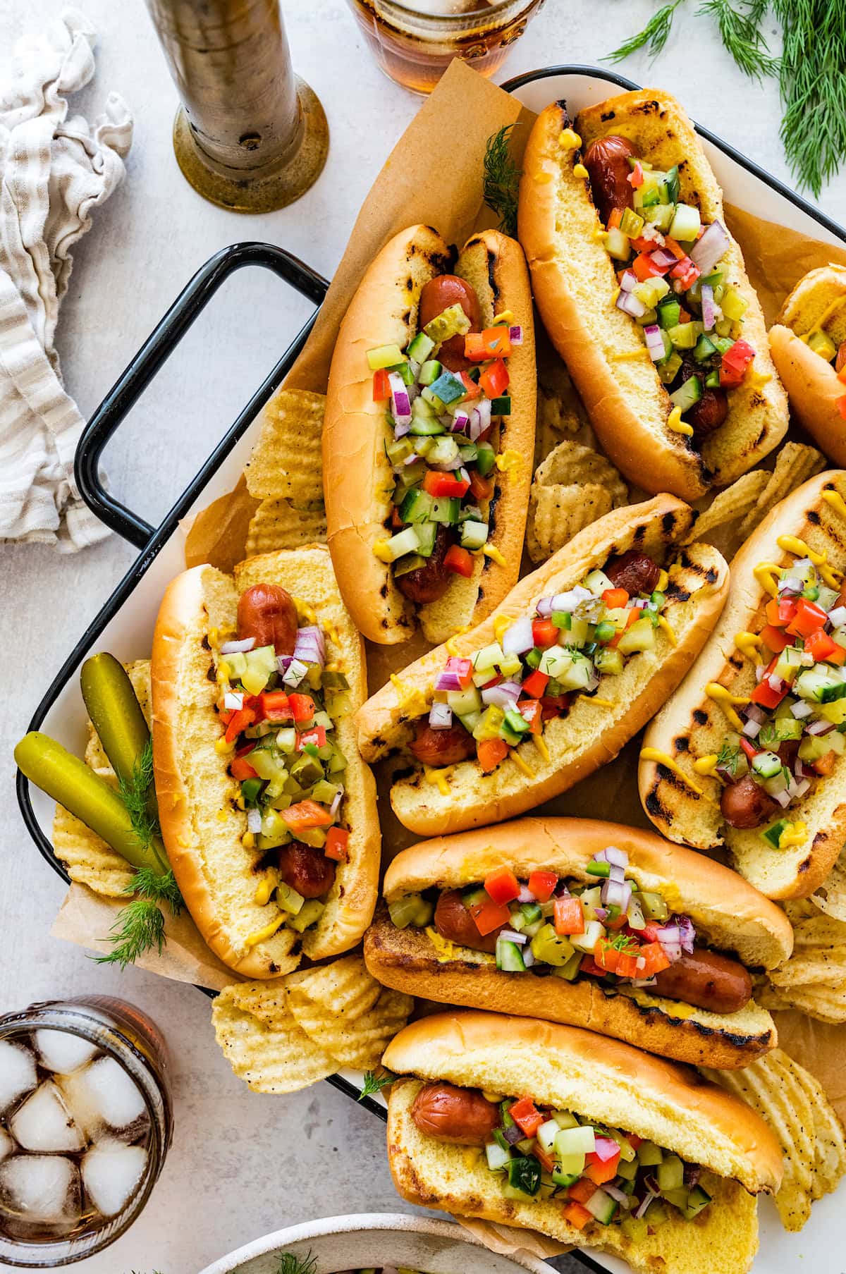 hot dogs topped with pickle de gallo. 