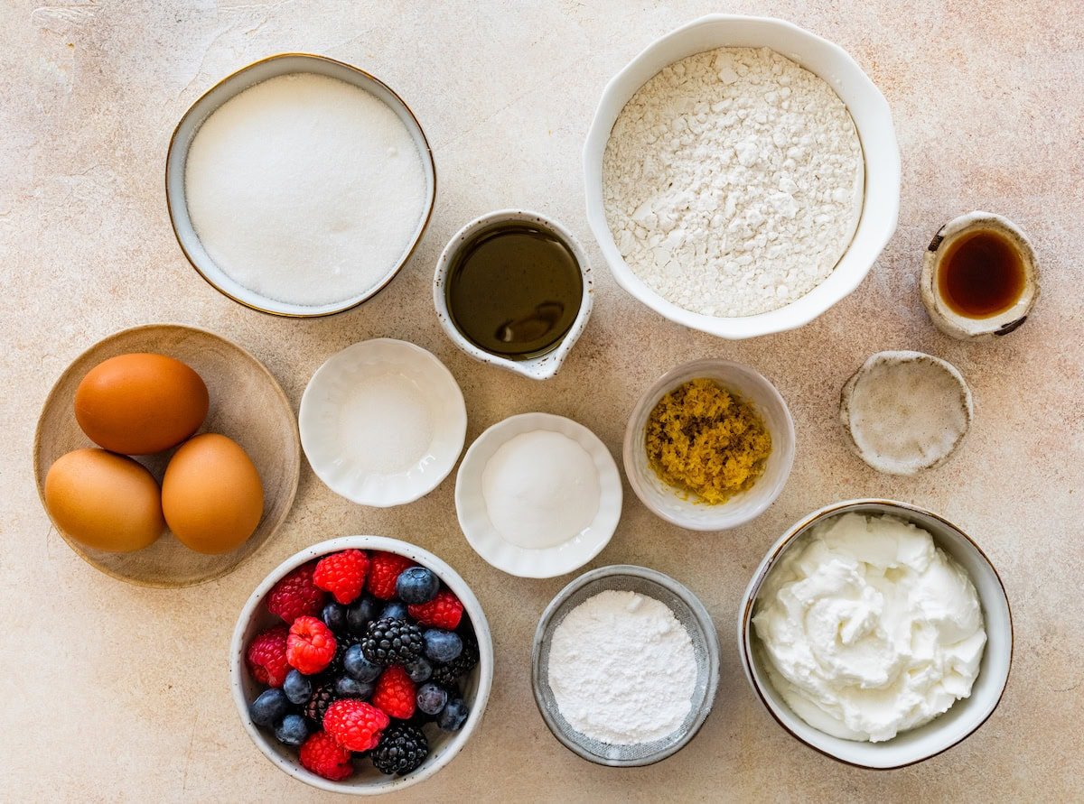 ingredients in bowls to make easy yogurt cake. 