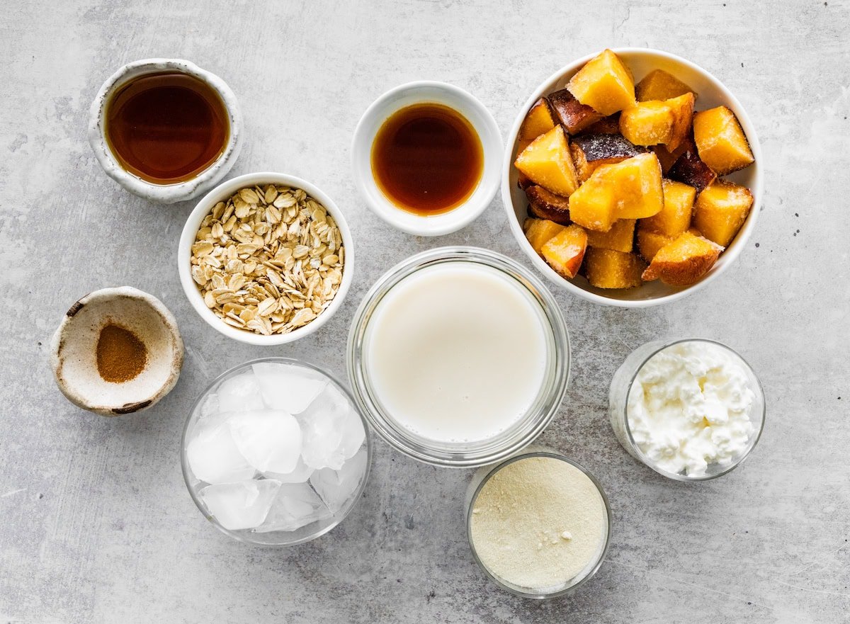 ingredients in bowls to make peaches and cream smoothie.