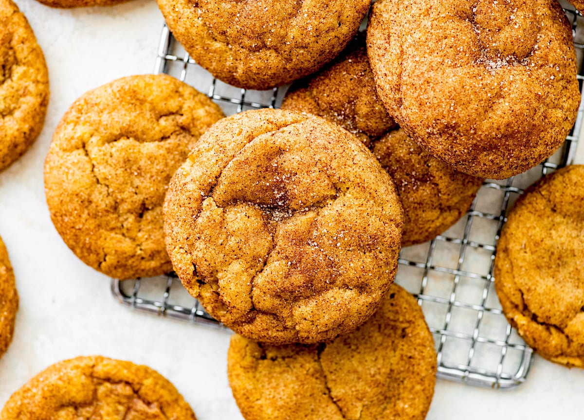 close up of pumpkin snickerdoodles on cooling rack. 