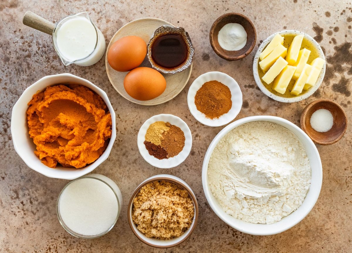 ingredients in bowls to make brown butter pumpkin bread. 