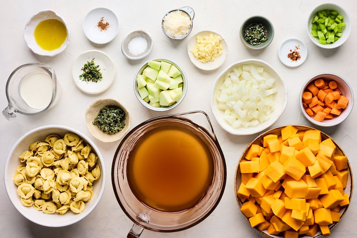 ingredients in bowls to make butternut squash tortellini soup.