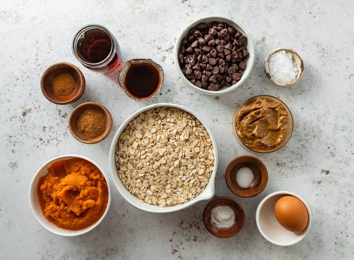 ingredients in bowls to make pumpkin chocolate chip oatmeal bars. 