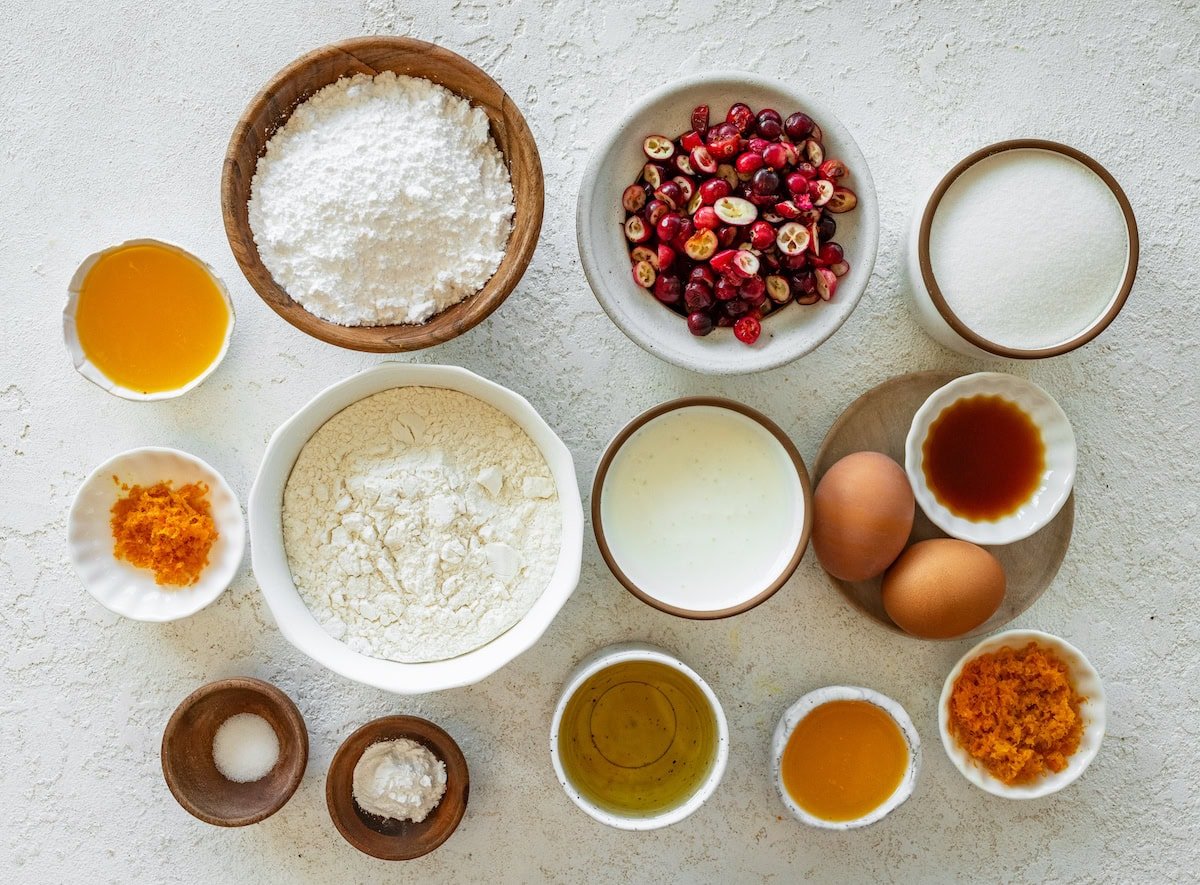 ingredients in bowls to make cranberry orange bread. 