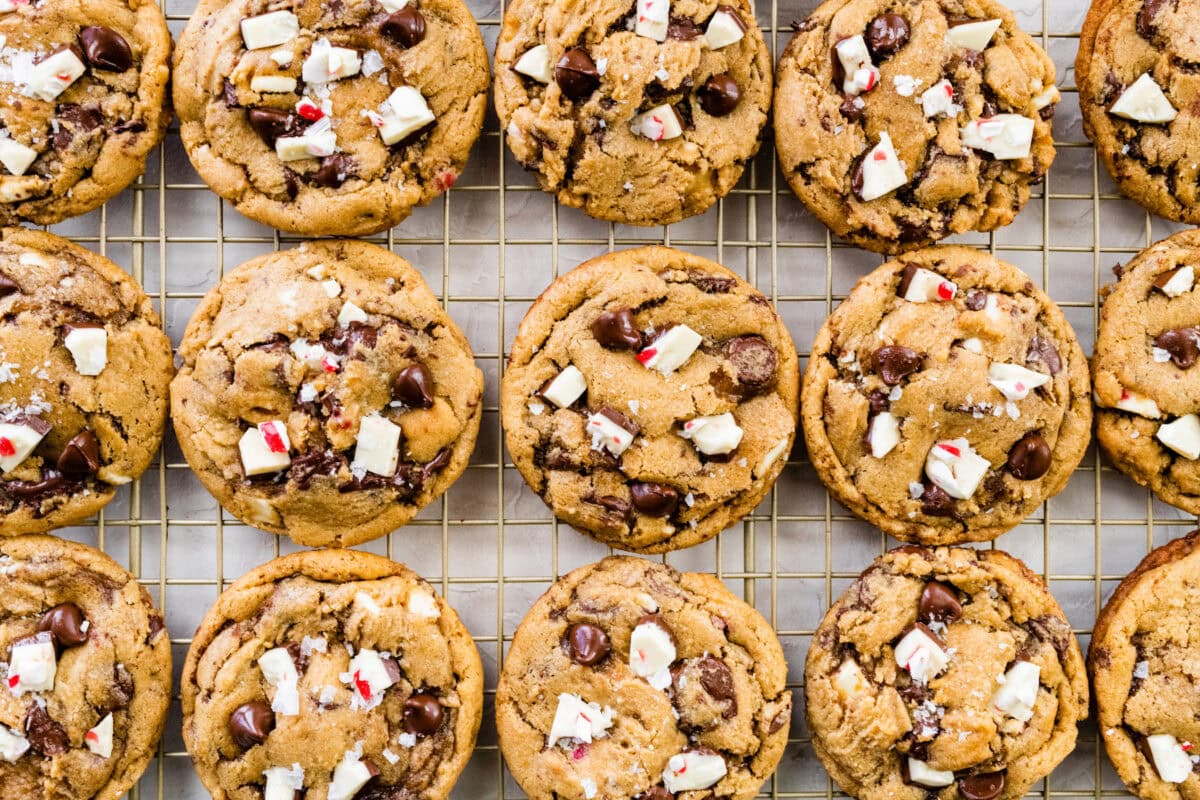 peppermint bark chocolate chip cookies on cooling rack. 