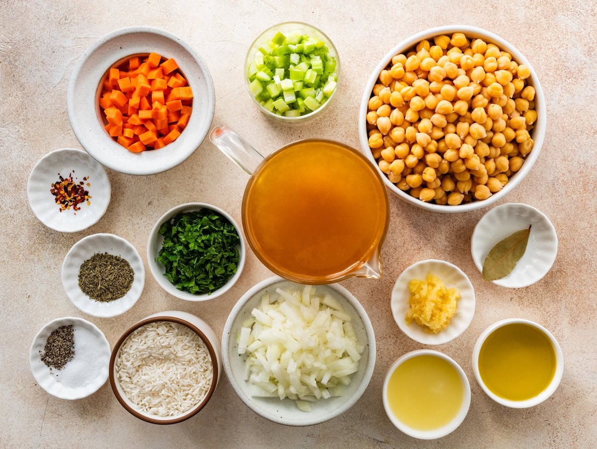 ingredients in bowls to make chickpea and rice soup.