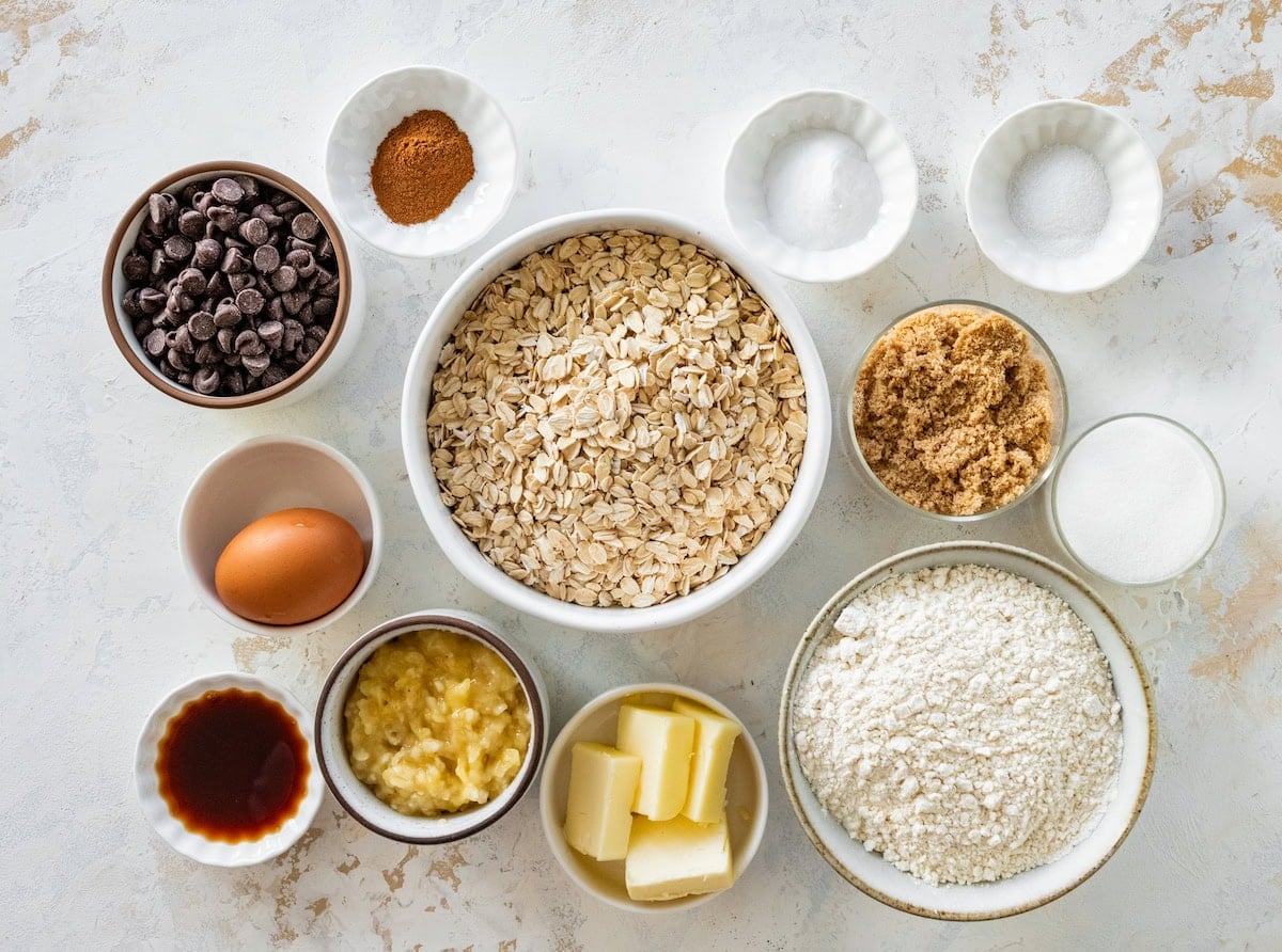 ingredients in bowls to make banana oatmeal chocolate chip cookies. 