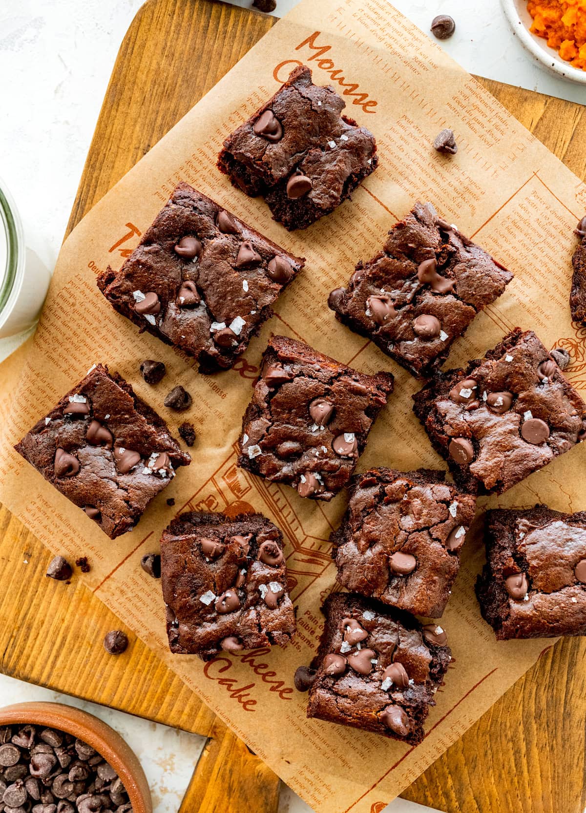 sweet potato brownies cut into squares on parchment paper.