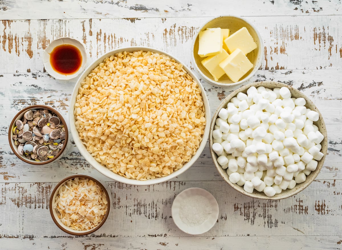 ingredients in bowls to make Cadbury egg rice krispie treats.
