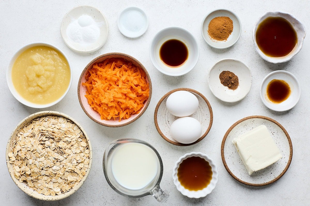 ingredients in bowls to make carrot cake pancakes.
