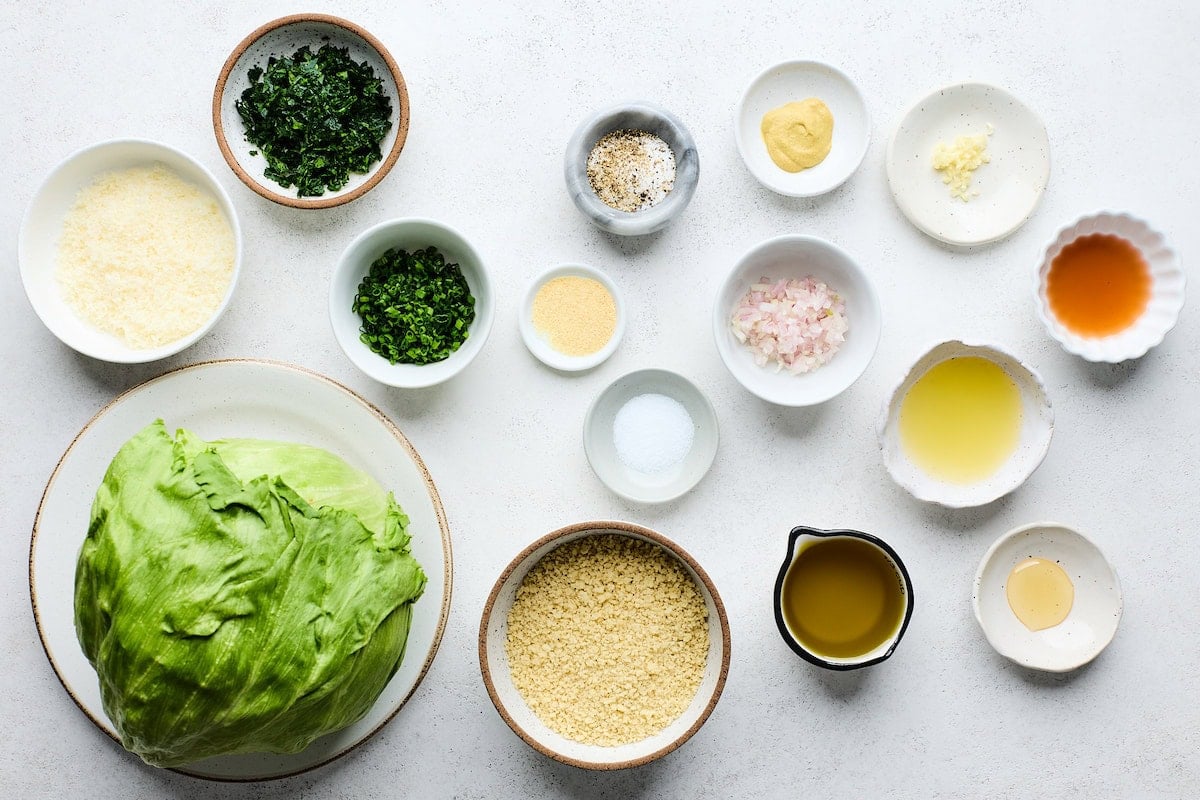 ingredients in bowls to make lemon parmesan wedge salad.