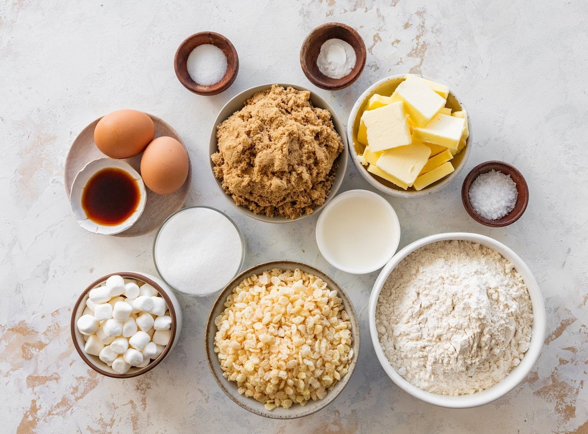 ingredients in bowls to make rice krispie treat cookies.