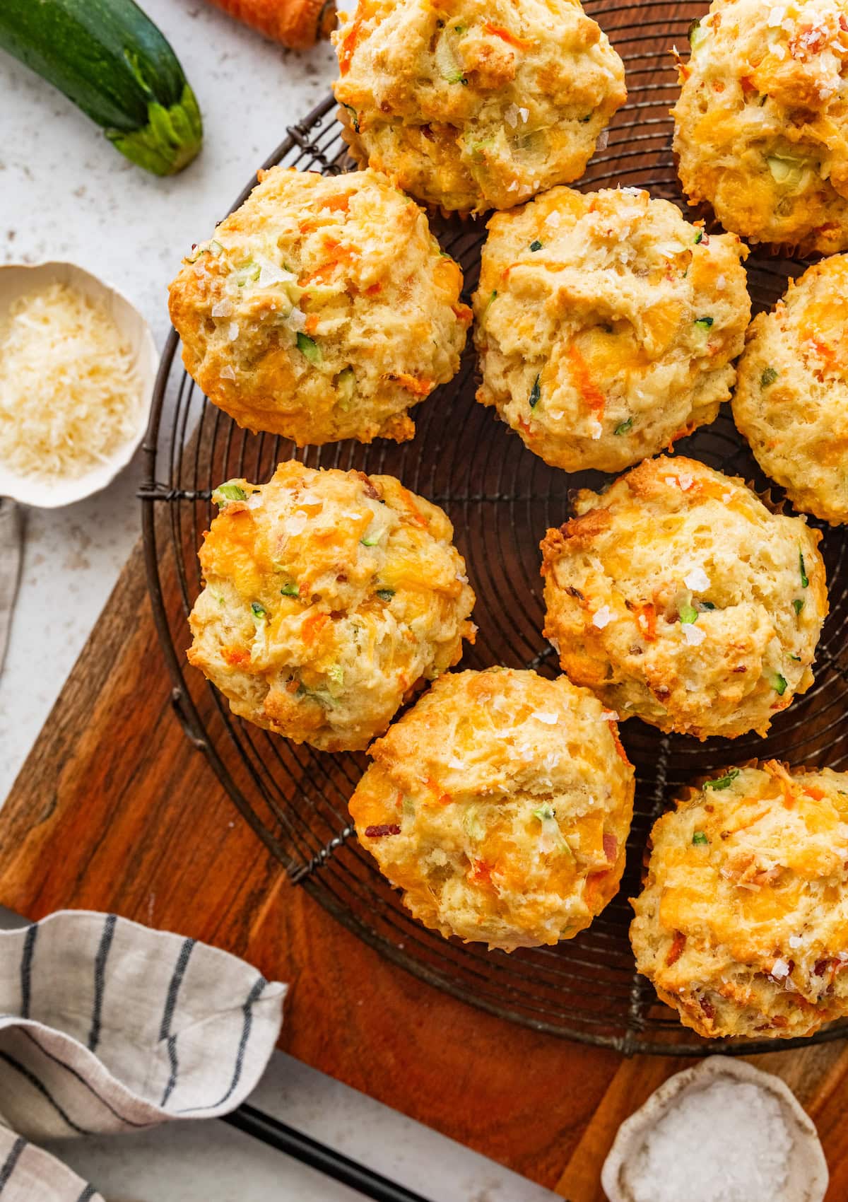 cheesy savory muffins on cooling rack.