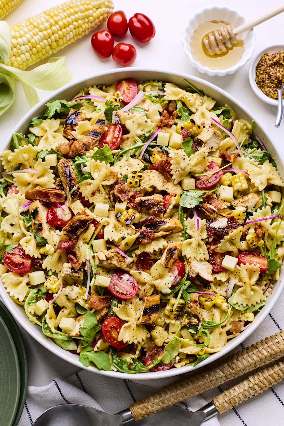 honey mustard chicken pasta salad in serving bowl.