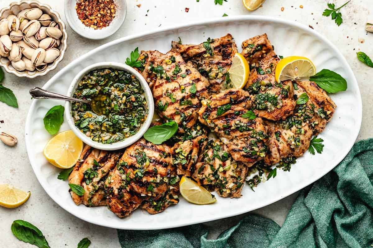 Grilled Lemon Herb Chicken Thighs with Pistachio Chimichurri