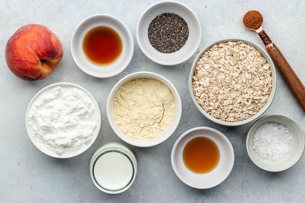 ingredients in bowls to make peach overnight oats.