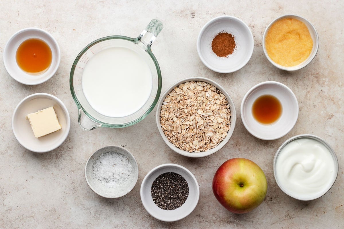 ingredients in bowls to make apple pie overnight oats.